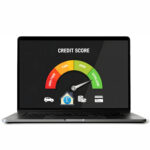 Credit score gauge showing excellent rating on a laptop screen.