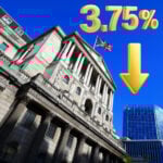Bank of England building with UK flag and 3.75% interest rate cut graphic
