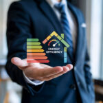 Energy-efficiency graphic hovering above a professional's outstretched hand, highlighting EPC upgrades for landlords