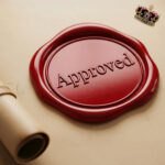 Royal Assent approval seal symbolising the Planning and Infrastructure Bill becoming law