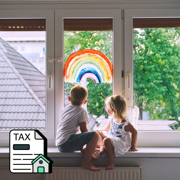 Children sitting by a window with a painted rainbow, symbolising how housing tax changes may impact families.