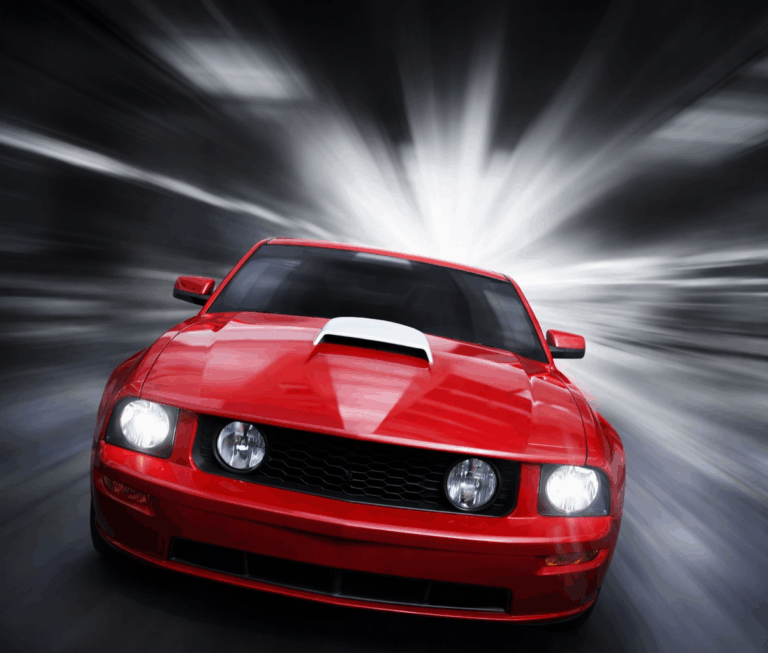 Red sports car speeding forward, symbolising landlords selling ahead of the property market rush