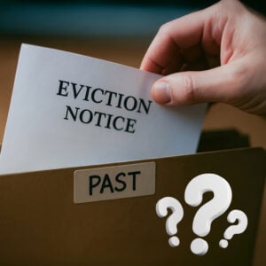 Eviction notice placed in a file marked “Past,” symbolising landlord decisions on serving Section 21 notices