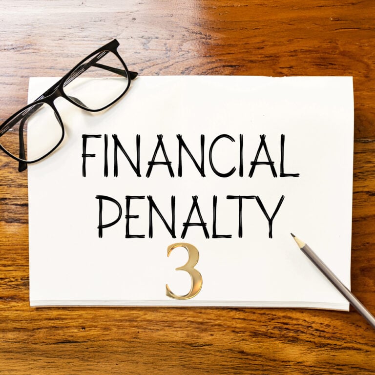 Financial penalty notice with glasses and pencil, illustrating council enforcement action against unlicensed rental properties