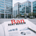 Ban rent review document with charts in front of modern office buildings, illustrating impact on commercial property values