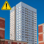 High-rise residential block highlighting cladding and building safety concerns amid calls for a public inquiry