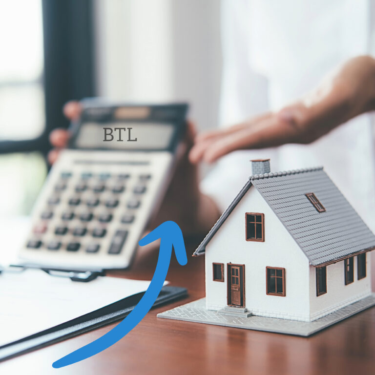 Buy-to-let mortgage calculator beside model house illustrating UK rental property lending