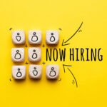 Now hiring graphic with people icons highlighting recruitment linked to selective licensing enforcement