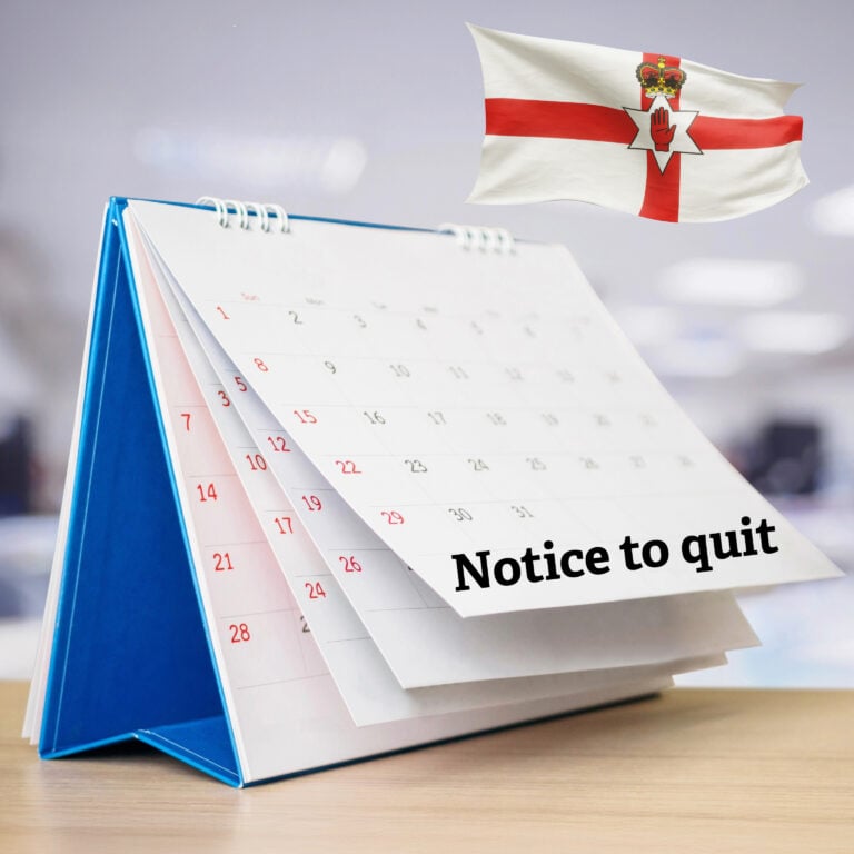 Desk calendar showing extended notice to quit dates with Northern Ireland flag in the background