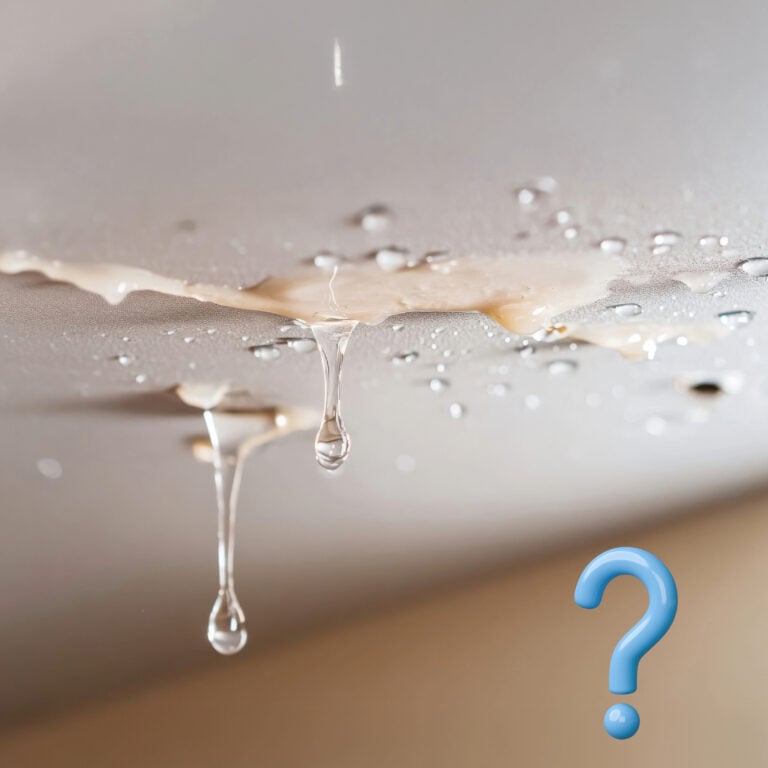 Water dripping through a damaged ceiling, illustrating a residential leak affecting flats below