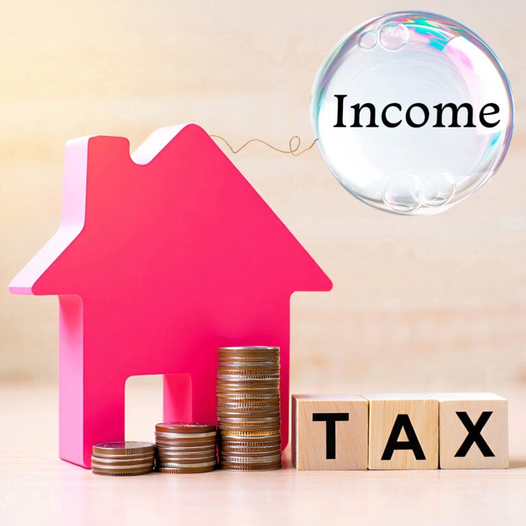 House silhouette with stacked coins and tax blocks symbolising higher property income taxes and pressure on landlords