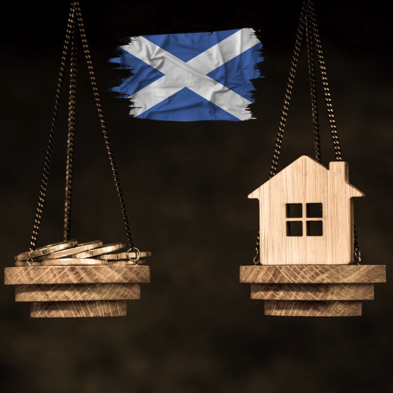 Scotland flag above balanced scales weighing coins against a house, symbolising rent stability in the private sector