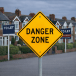 Danger Zone road sign in front of rental homes with To Let boards