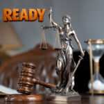 Lady Justice statue and gavel symbolising county court possession hearings under the Renters’ Rights Act.