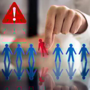 Hand removing a red figure from a line of blue figures, symbolising tenant discrimination risks