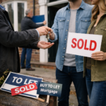 Landlord handing house keys to tenant buyers outside property with a “Sold” sign during direct tenant purchase