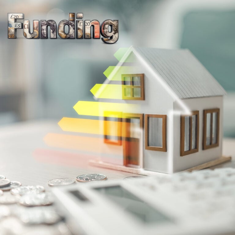 Model house with energy rating arrows and funding text, symbolising property efficiency upgrades and costs