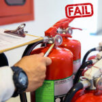Failed fire extinguisher inspection highlighting non-compliance in building fire safety