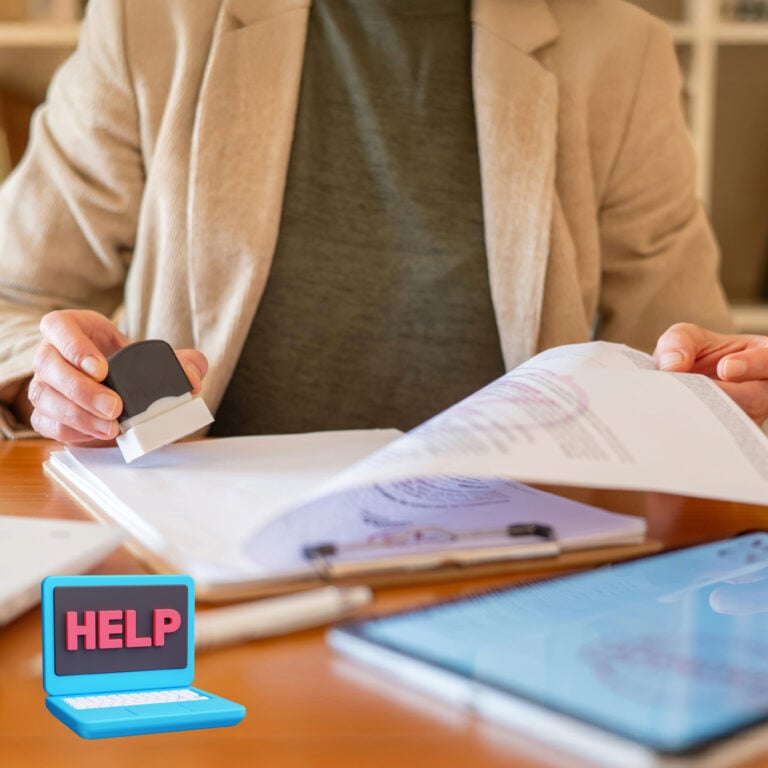 Letting agent stamping tenancy documents during a landlord compliance review ahead of the Renters’ Rights Act