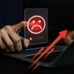 Tenant leaving a one-star review on a laptop screen, symbolising rising complaints about rental property services.