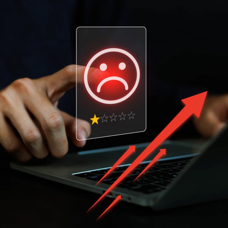 Tenant leaving a one-star review on a laptop screen, symbolising rising complaints about rental property services.