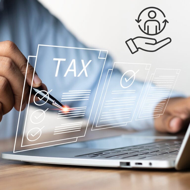 Landlord completing digital tax records on a laptop as part of Making Tax Digital compliance