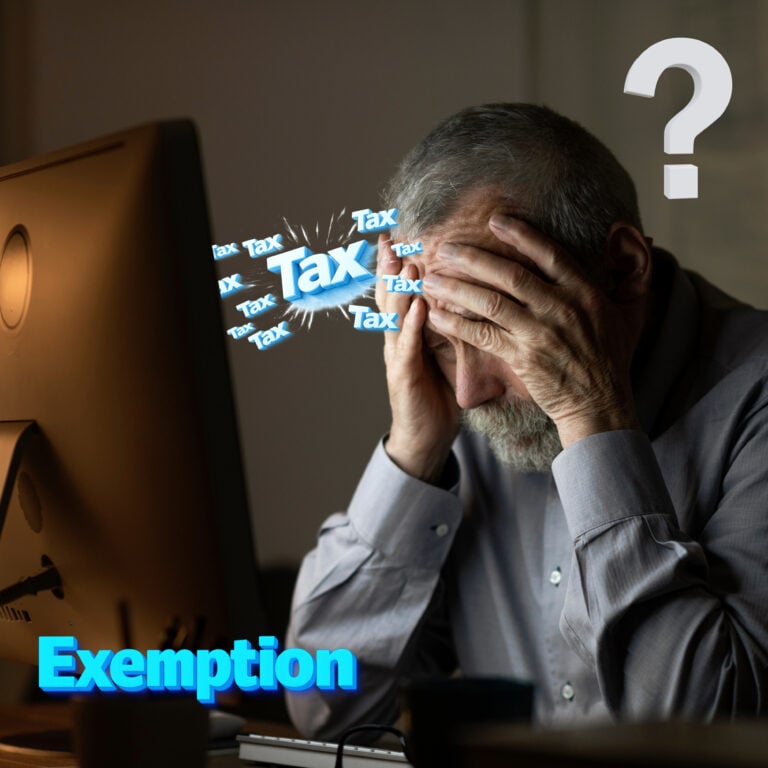 Elderly man stressed by tax paperwork at computer, symbolising relief through HMRC MTD exemption