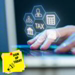 Person typing on a laptop with digital tax icons representing Making Tax Digital registration and online tax reporting.